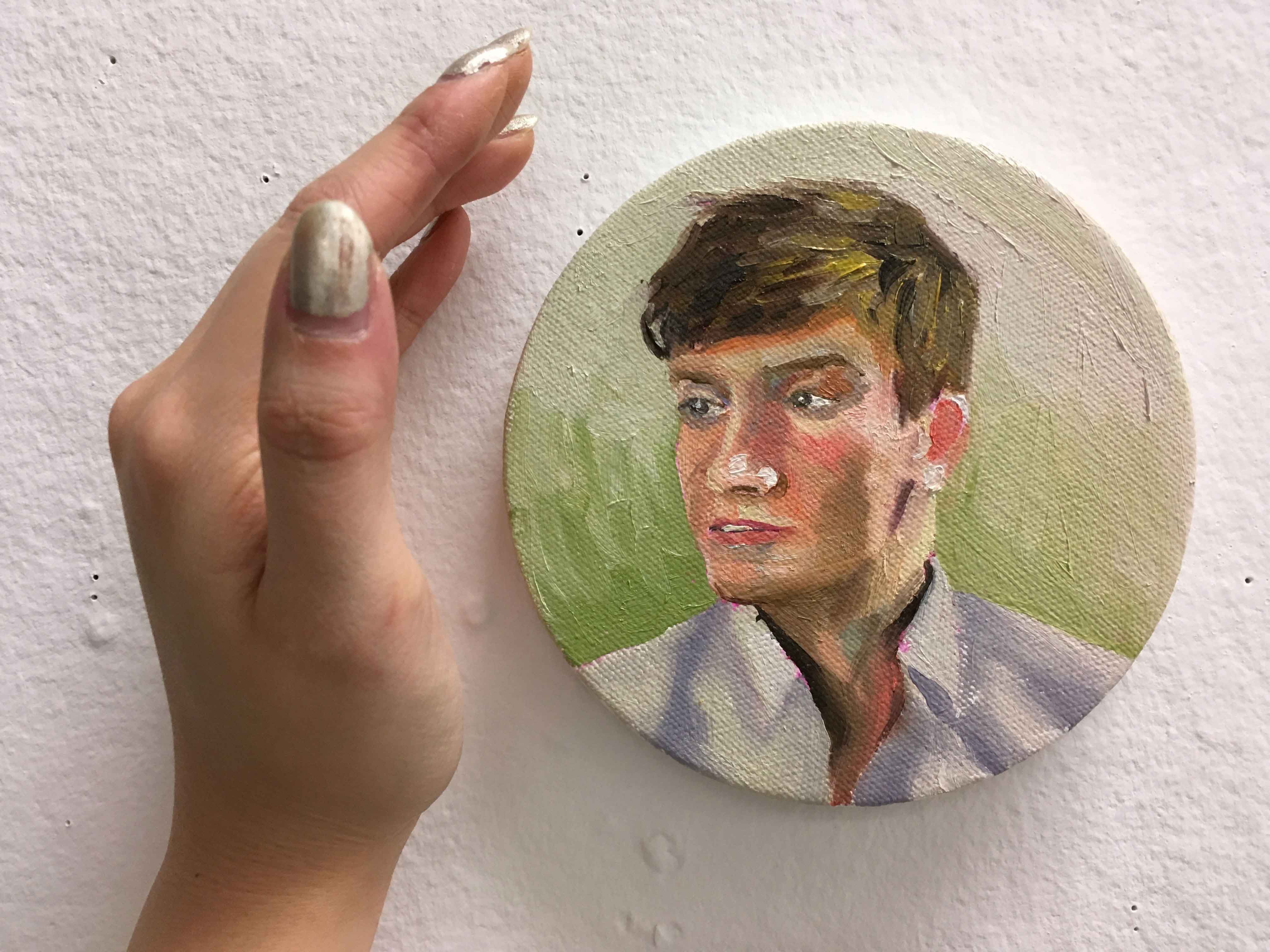 Miniature portrait of a friend.  Hand for scale.